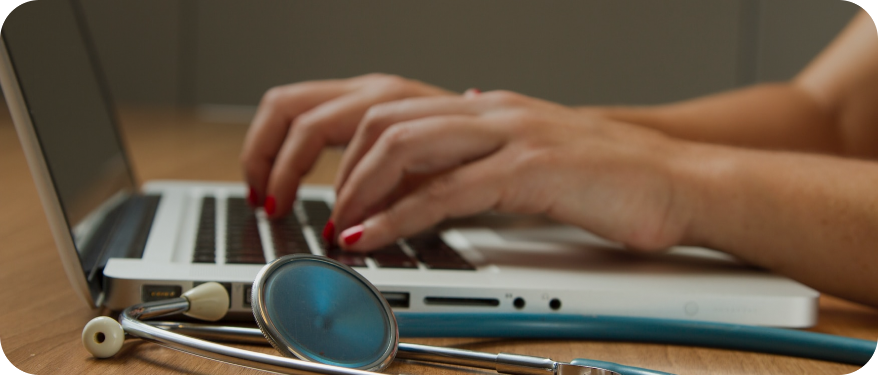 a person typing on a laptop