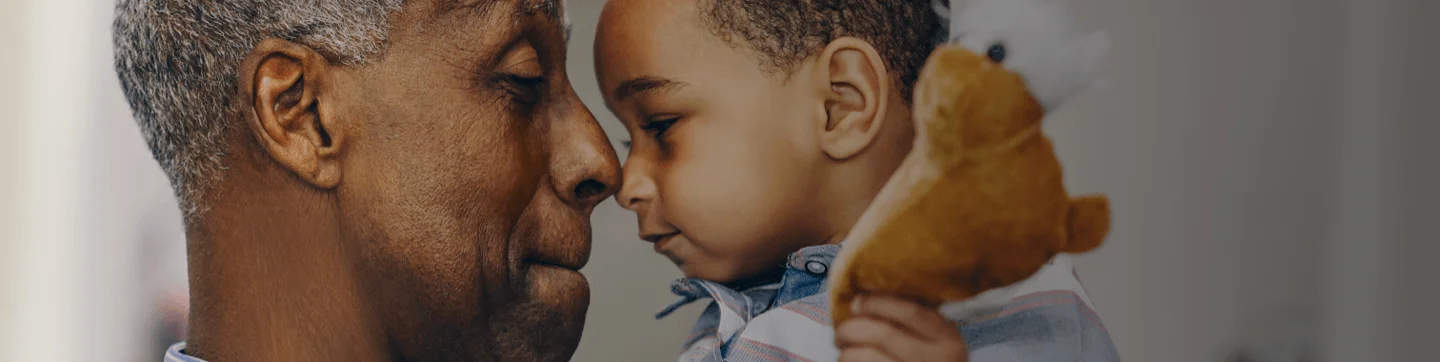 a man holding a baby